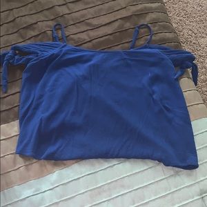 Forever 21 blue tank top with tie sleeves on arm